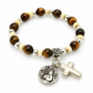 Bracelet dizainier sur élastique pour enfant.Grains en bois et oeil de tigre. Croix en métal avec médaille de Ste Rita